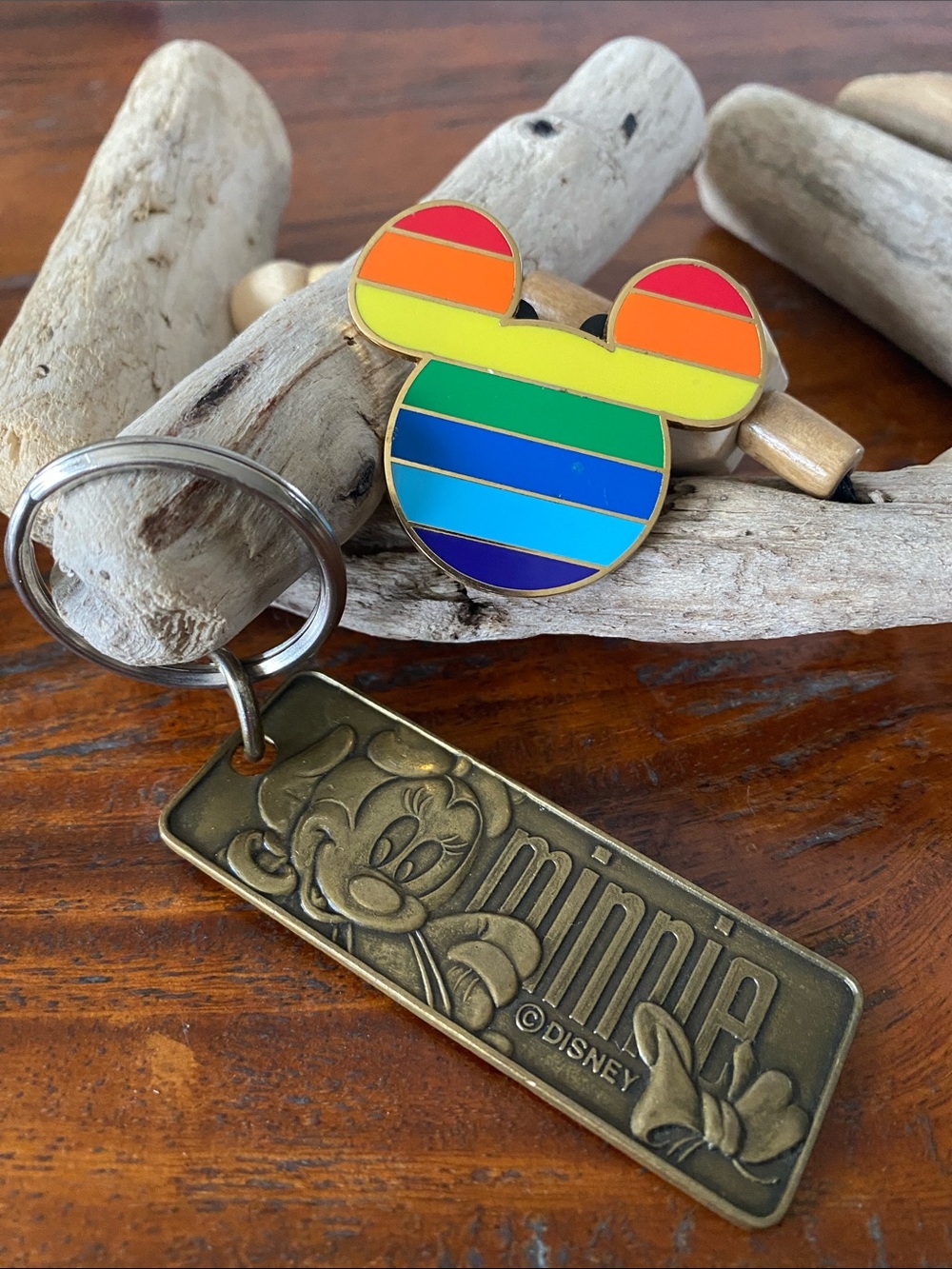 DISNEY Gold tone Rainbow Mickey Mouse logo pin w/ black Mickey pin holder. 2008